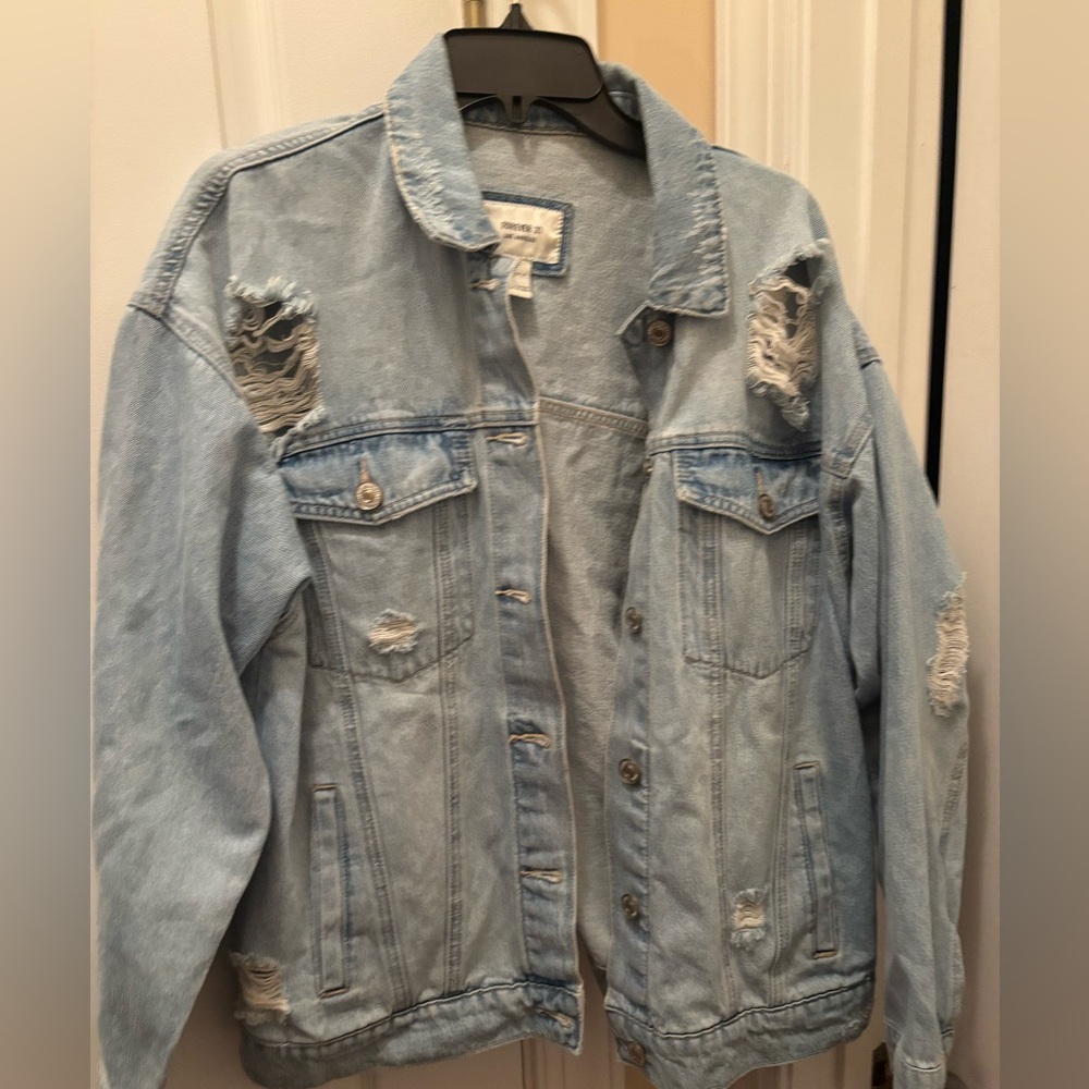 Forever 21 LA large vintage blue Jean jacket, holes on front/ back light denim